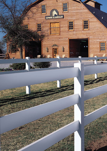 Vinyl Post and Rail Fence by a Barn