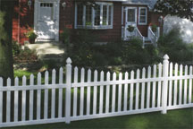 Danbury Concave Vinyl Fence by a Brick House